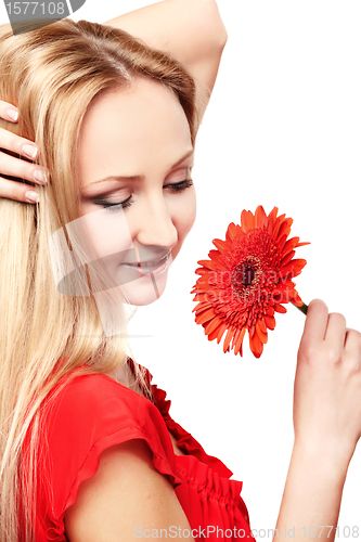 Image of Young lady with red gerbera