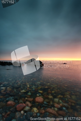 Image of Sunset in a calm bay