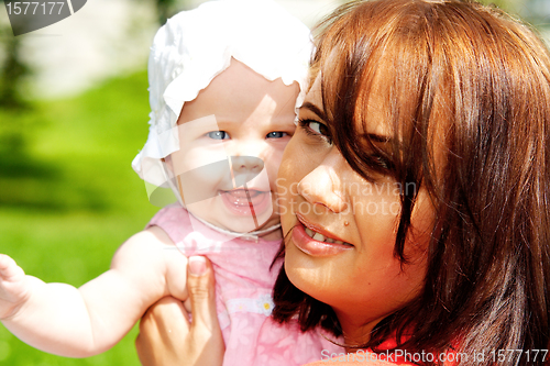 Image of Young mother with baby