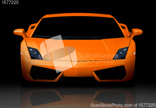 Image of Orange supercar. Front view.