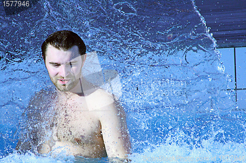 Image of man relaxing in water