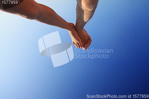 Image of beautiful feet of man and woman