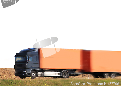 Image of truck moving on a highway