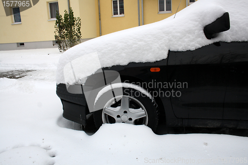 Image of black car in winter