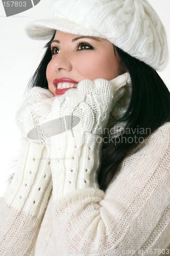 Image of Beautiful woman in winter clothes
