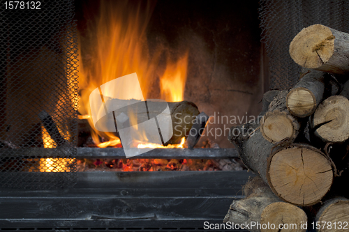 Image of fireplace and firewood