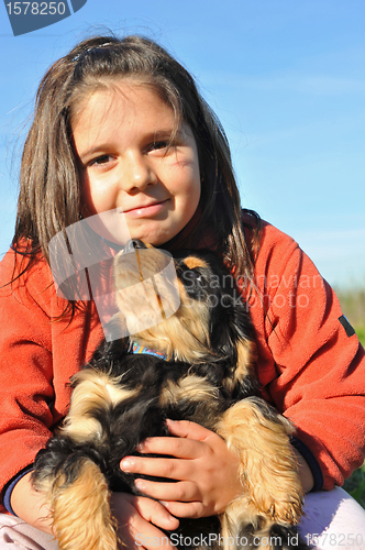 Image of puppy english cocker and child