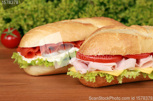 Image of Sandwiches with salmon and ham