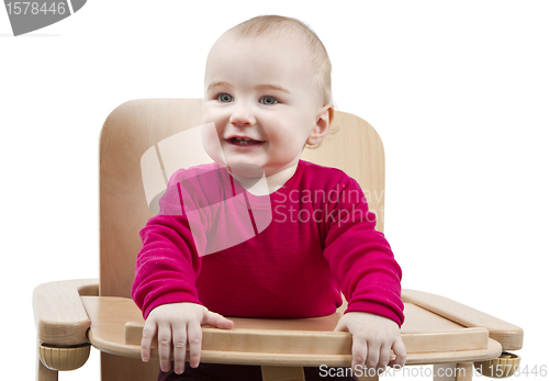 Image of young child sitting in high chair