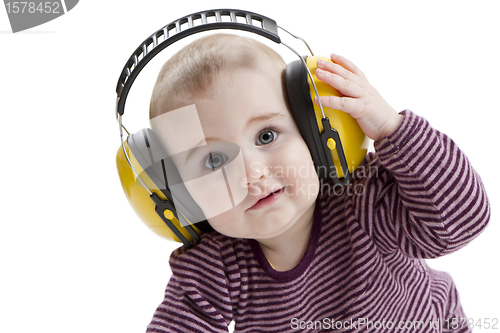 Image of young child with ear protector