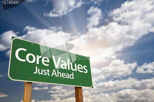 Image of Core Values Just Ahead Green Road Sign and Clouds