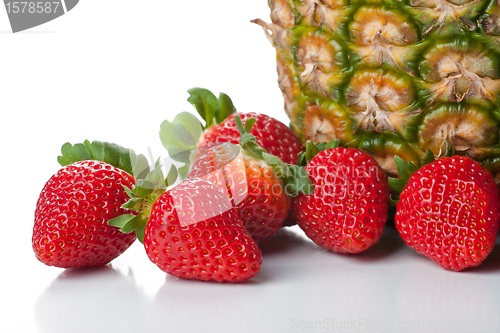 Image of Isolated fruits - Strawberries and pineapple 