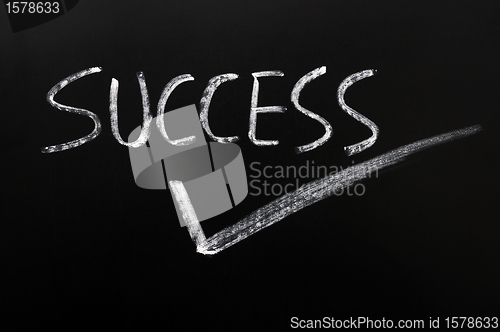 Image of Word of success with a tick
