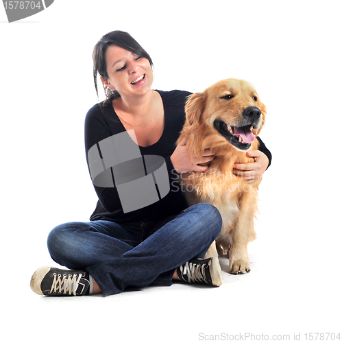 Image of golden retriever and woman