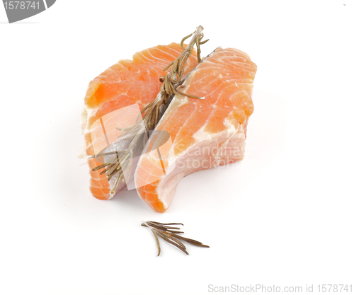 Image of Raw Salmon Fish Fillet with rosemary ion