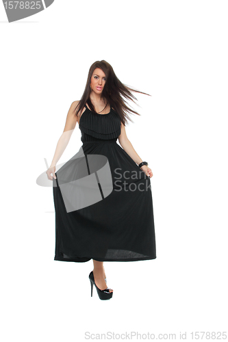 Image of Pretty sexy girl full length posing in a nice black dress