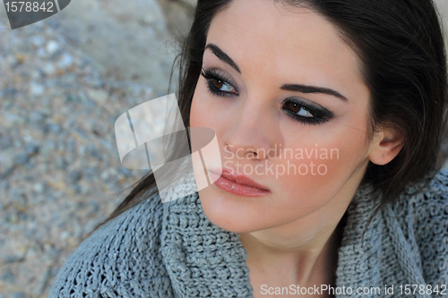 Image of beautiful woman by the sea