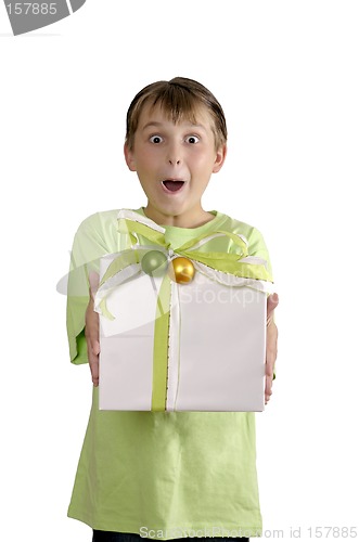 Image of Excited boy holding a wrapped present
