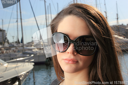 Image of Young woman at the port