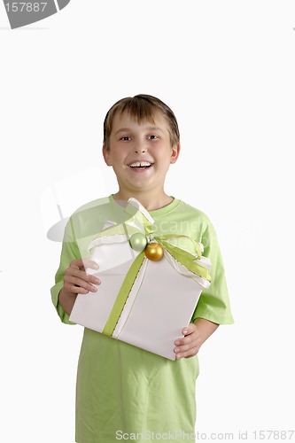 Image of Smiling boy holding a gift
