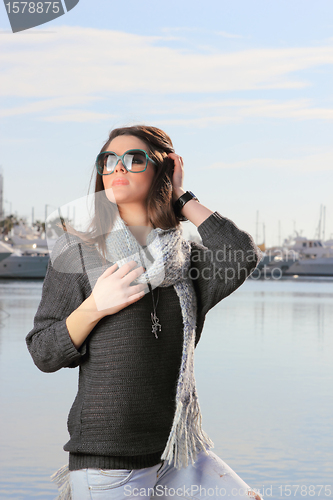 Image of Young woman at the port