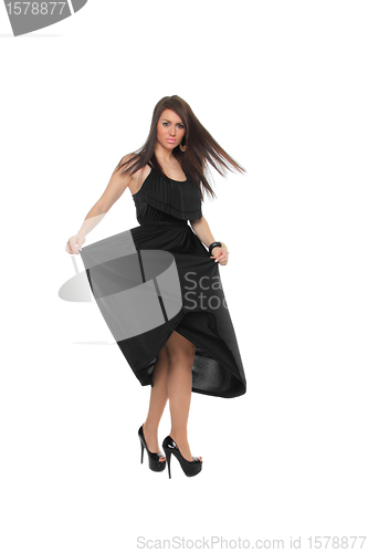 Image of Pretty sexy girl full length posing in a nice black dress