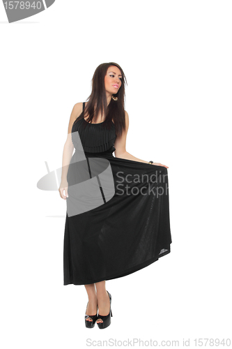 Image of Pretty sexy girl full length posing in a nice black dress