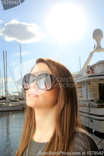 Image of Young woman at the port