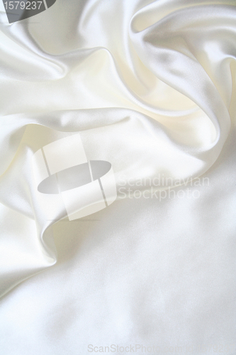 Image of Smooth elegant white silk as background 