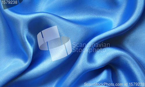 Image of Smooth elegant blue silk as background