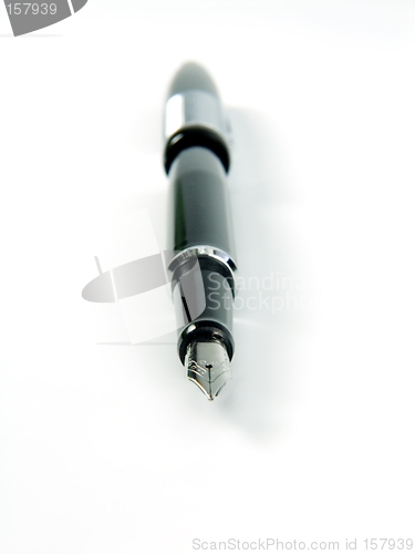 Image of black pen on white background