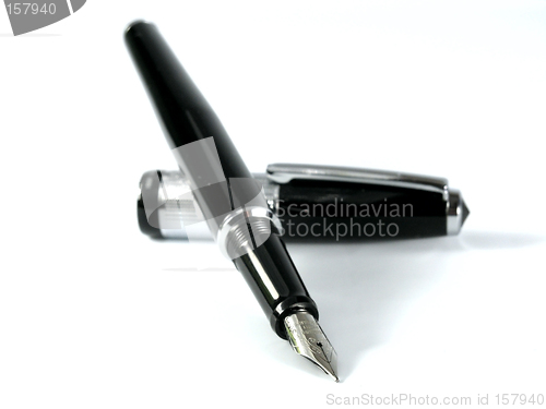 Image of black pen on white background