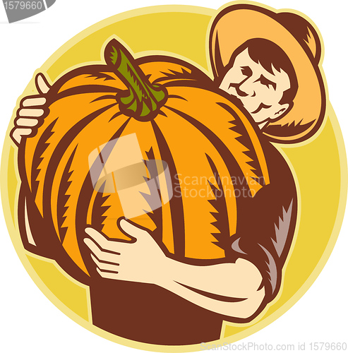 Image of Organic Farmer With Giant Pumpkin