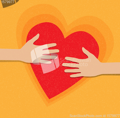 Image of hands holding the heart. charity