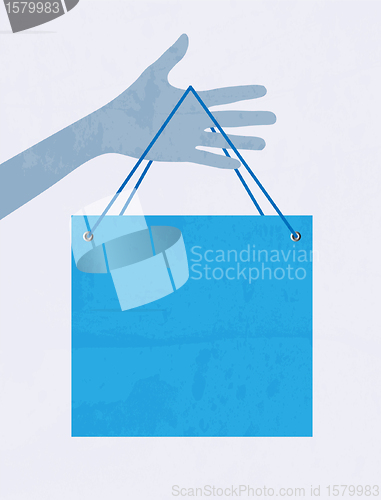Image of Hand with shopping bag. Vector
