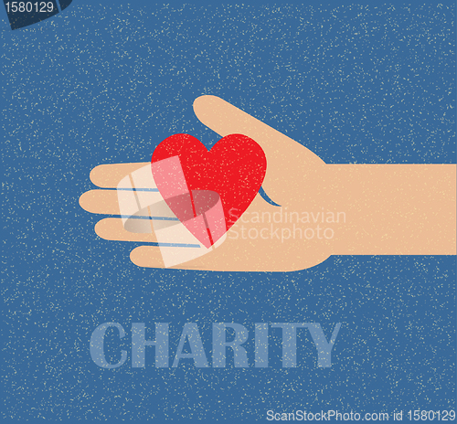 Image of hand holding the heart. charity