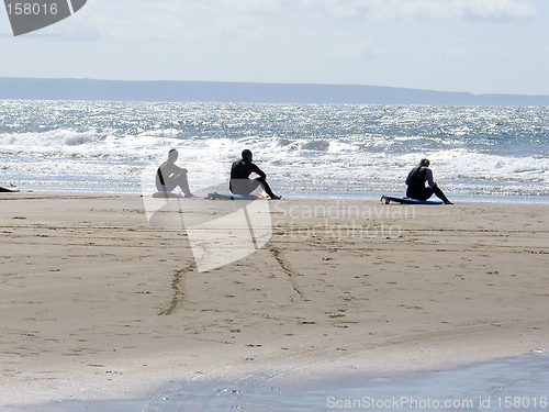 Image of Three Surfers