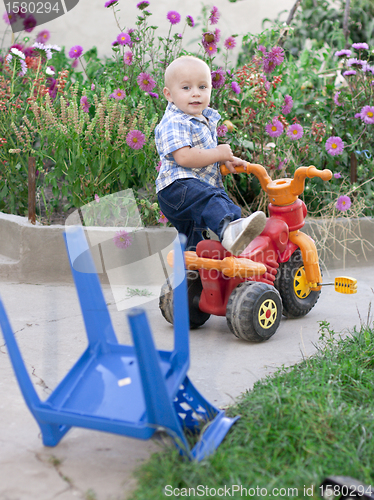 Image of boy riding bike