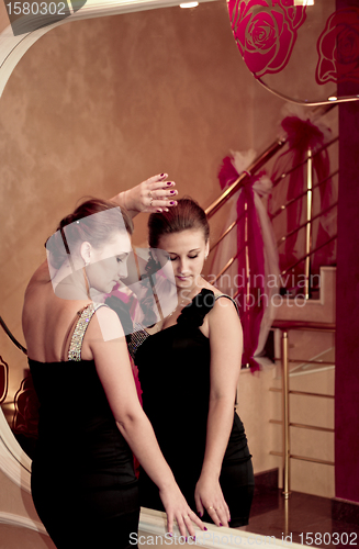 Image of girl in the mirror