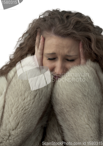 Image of girl held her head