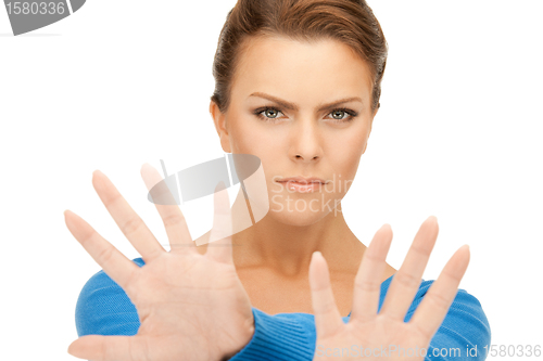 Image of woman making stop gesture