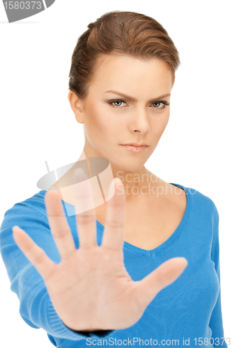 Image of woman making stop gesture