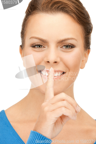 Image of finger on lips