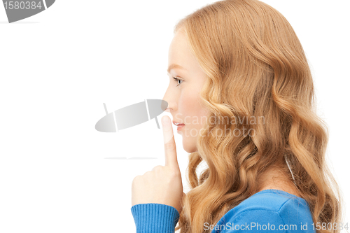 Image of finger on lips