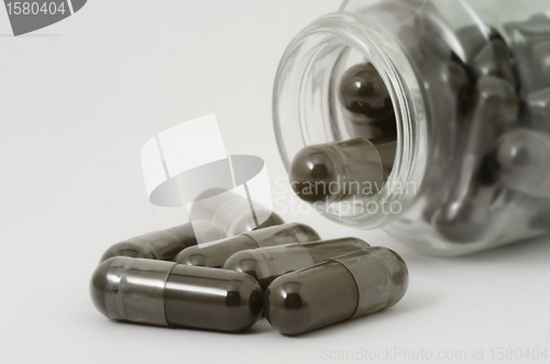 Image of black pills
