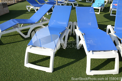 Image of chairs at poolside