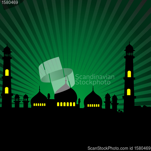 Image of silhouette of a mosque with green rays background