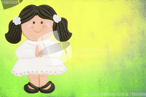 Image of greeting invitation card, first communion cute girl brown