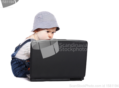 Image of Little boy with a laptop