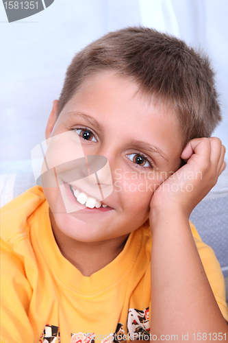 Image of Portrait of young smiling boy. 